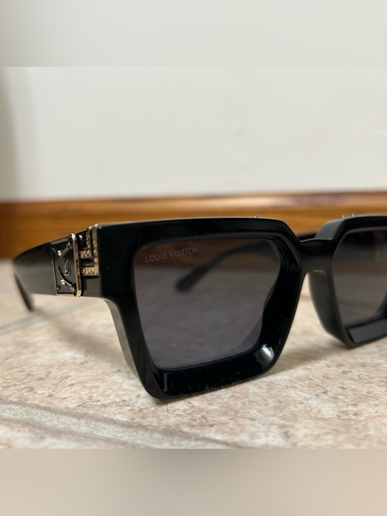 Louis Vuitton Accessories - Louis Vuitton Black Sunglasses with Gold Detail
Millionaire
